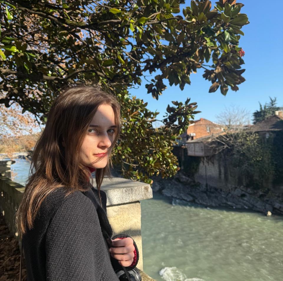 Sopho in the shade by a river