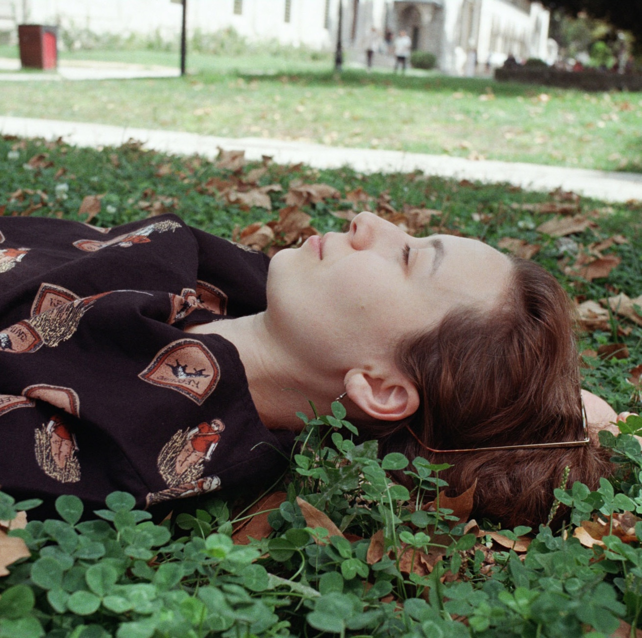Tuğba resting in the grass in Istanbul